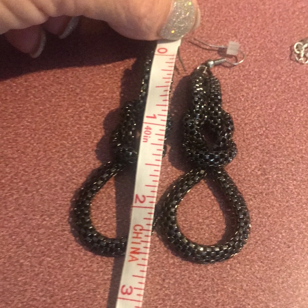 Wire gunmetal knotted chain earrings